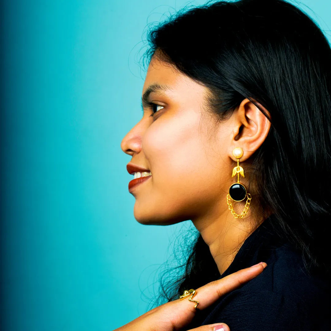 Bela Earrings revealing quiet mystery in brass paired with natural stone