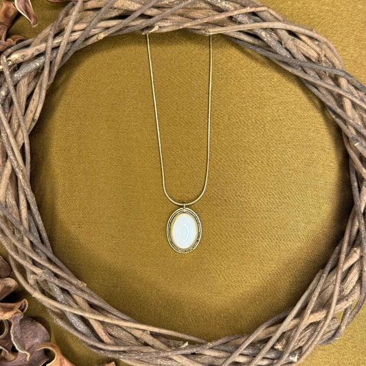 Novara Oval Mother-of-Pearl Pendant framed in soft 18K Gold Plated radiance