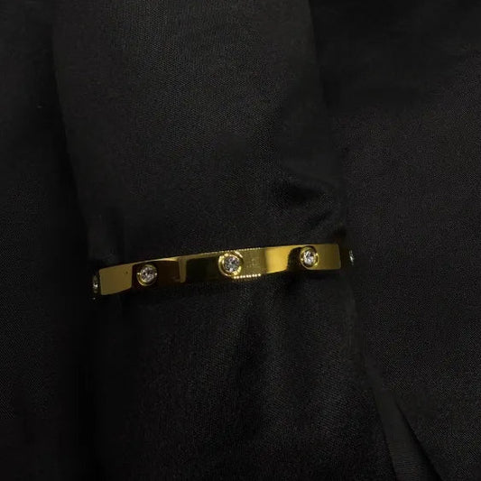 Alira Flowing Daily-Wear Bracelet framed in soft 18K Gold Plated warmth