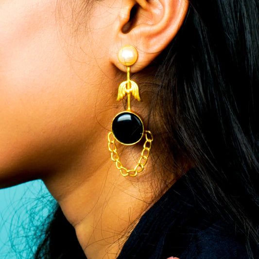 Bela Earrings revealing quiet mystery in brass paired with natural stone