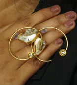 Eira Earrings circling calm with brass frames and mother-of-pearl softness