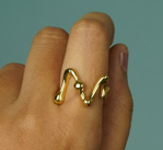 Revya – A sculpted stainless steel ring, reflecting strength and modern elegance